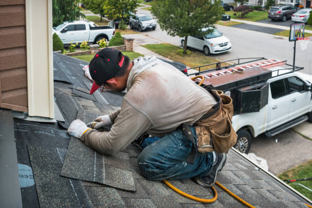 Professional Roof Replacement technician working in Amlin, OH